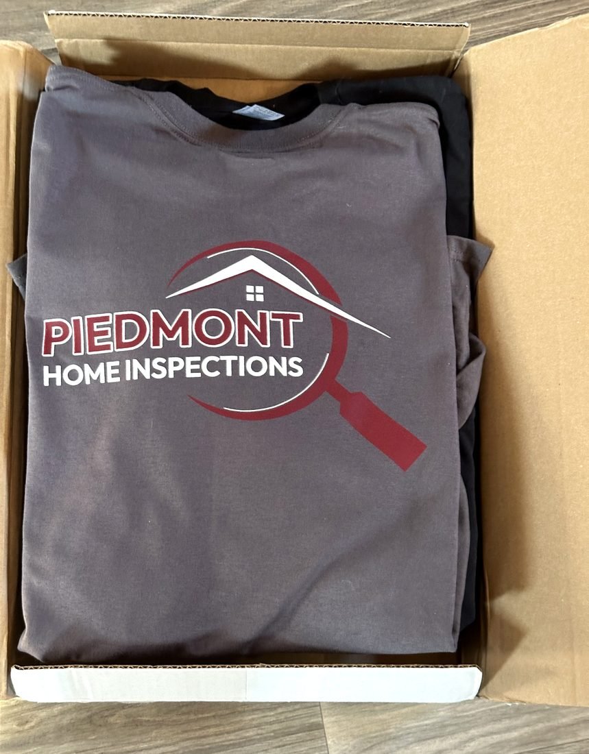 A finished embroidered apparel order packed for delivery